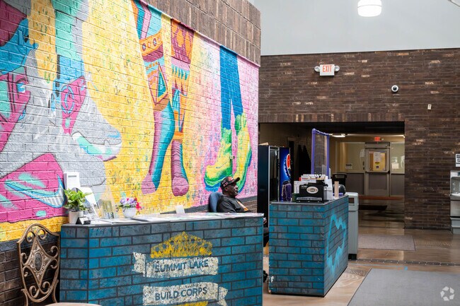 Summit Lake Community Center features an indoor basketball court and community spaces.