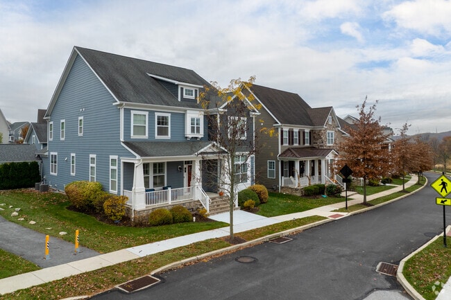 Charlestown neighborhoods feature Colonial-style homes with porches and landscaped yards.