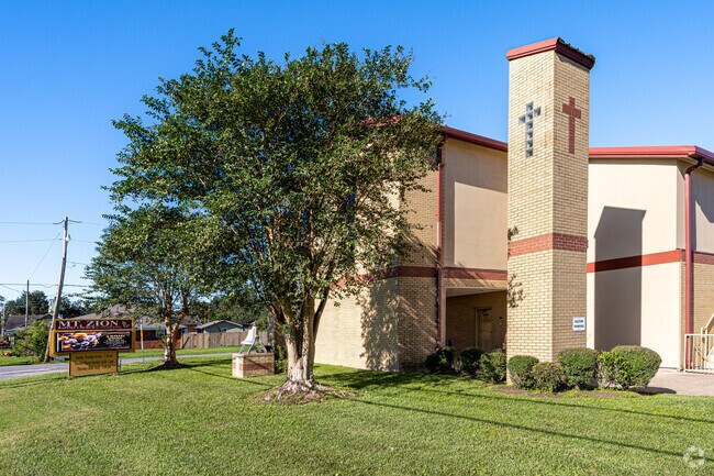Visit Mount Zion Baptist Church, an over 100-year-old church in Saint Rose.