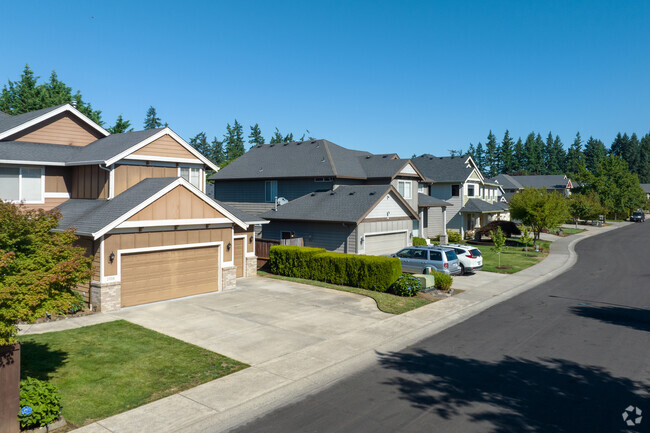 Homes along NE 154th Ave in Burton Evergreen have large, well manicured lawns.