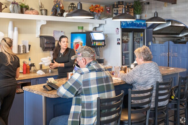 Enjoy a coffee at the counter of Village Cafe in North Dartmouth.