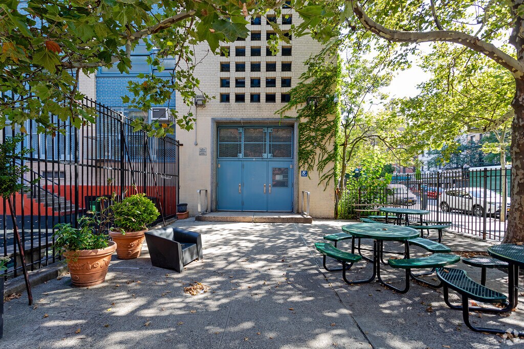 Ms 243 Center School has lots of open space for students to relax on.