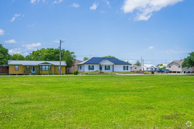 Many homes in Galliano sit above ground-level as a relief from any potential flooding in the neighborhood.