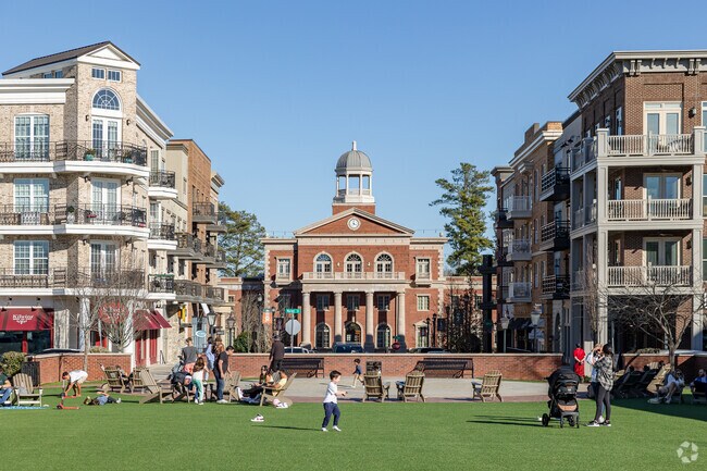 The lawn at Alpharetta's city center is a great place to lay out, play or gather.