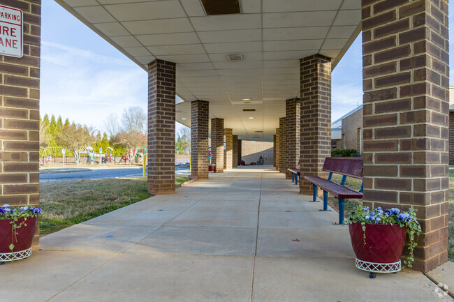 Covered walkway at main entrance and student drop off for J. B. Page Elementary School.
