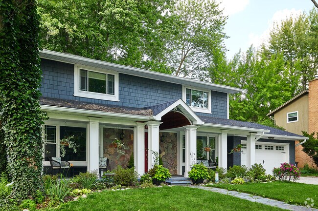 A few stately Colonials exist in Vernon Downs, tucked between the more common brick Ranches.