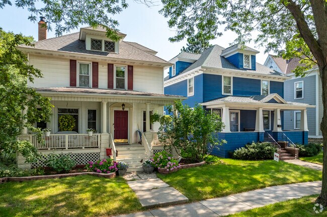 Homes in the Fort Howard neighborhood have mature trees for shaded yards.