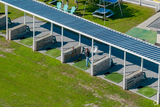 Hit your best shot at the driving range at Inlet Golf Range in Harbor Oaks.