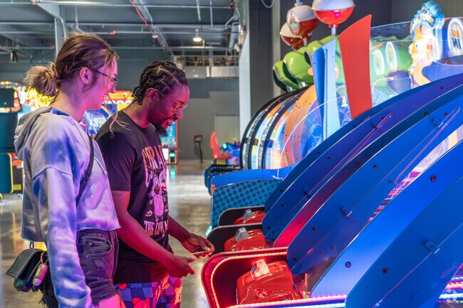 A couple wins 1000 tokens at Elev8 in Citrus Park.