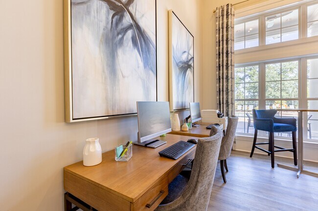 Business area with computer workstations in clubroom at Heron Lake