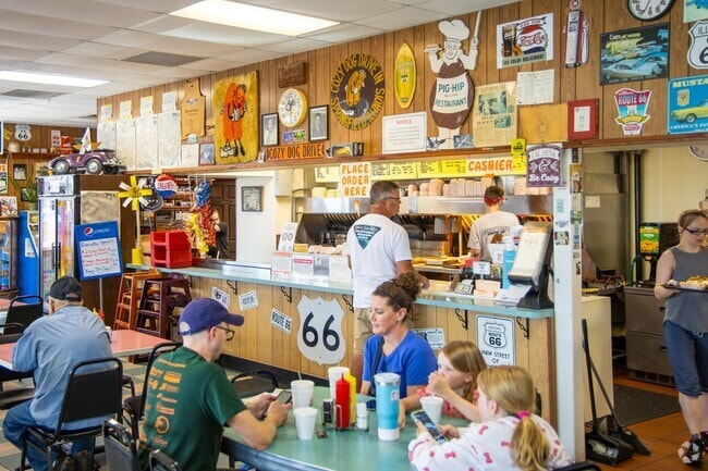 Cozy Dog Drive In is a local favorite restaurant near Bunn Park serving corn dogs and hot dogs.