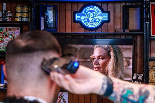Chill and watch some TV while you get a trim at Charlie's Barber Shop in Fayetteville.
