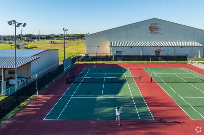 Alice High School has a modern sports field for football, soccer, and tennis courts.