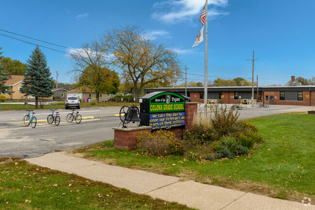 A look at the info board at the entrance to Colona School.