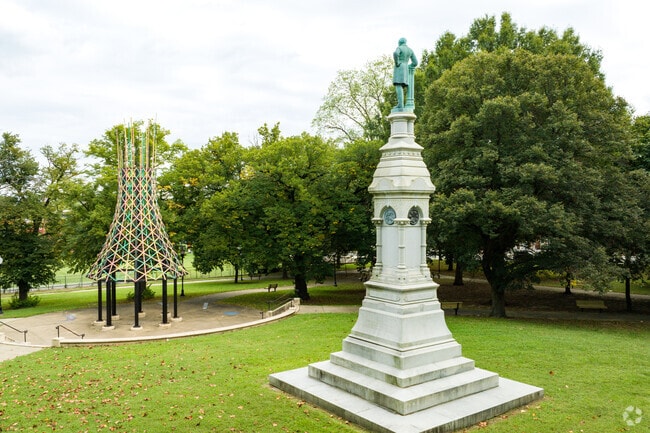 Sculptures dot the grounds in Harlem Square Park.