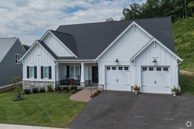 New traditional-style houses in Southern Hills blend classic architecture with modern amenities.