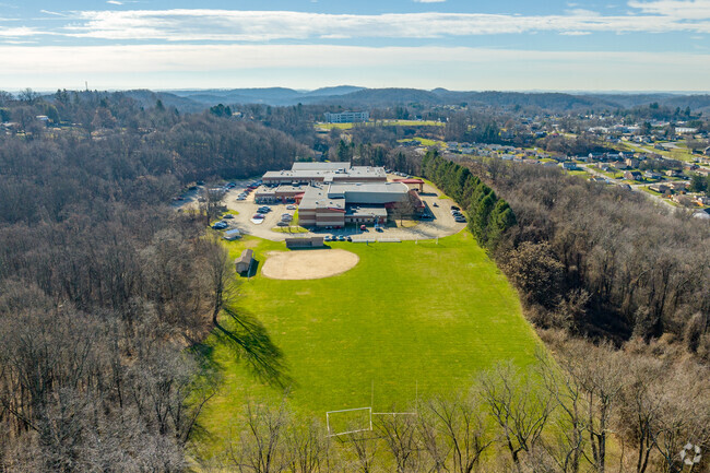 Jeannette Senior High School is surrounded by forest.