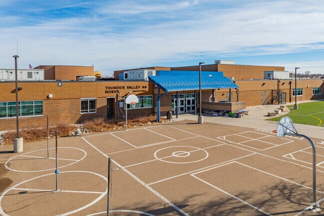 At Thunder Valley K-8, students thrive in a supportive and engaging atmosphere that emphasizes collaboration and hands-on learning. With diverse programs and extracurricular activities, this school empowers children to explore their passions and build the skills they need for a bright future.