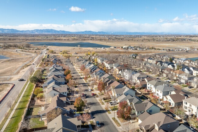 Walking paths wind through the neighborhood, offering residents outdoor experiences.