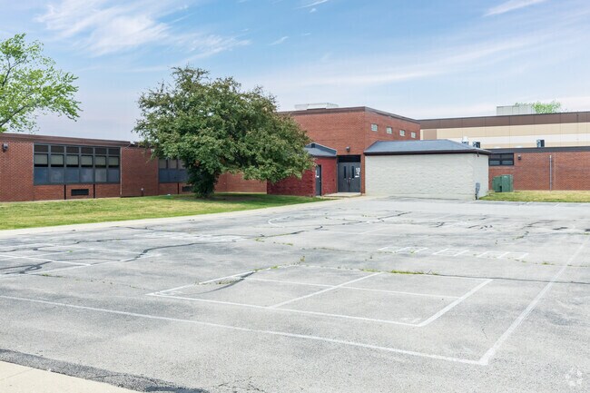 Painted outdoor games on pavement at the schools grounds.