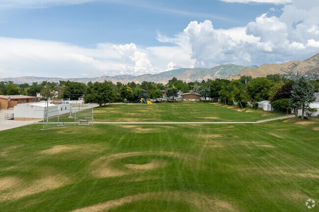 Sprawling green lawns at Rosecrest Elementary School.