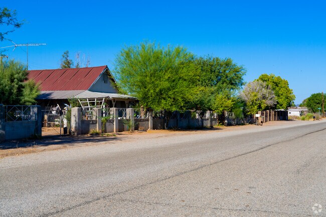 Trees offer shade around homes in the neighborhood.