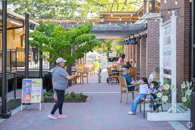 Downtown Flowery Branch bursts with rich cultural heritage and boasts a lively community full of colorful characters, bustling events, and captivating local art.