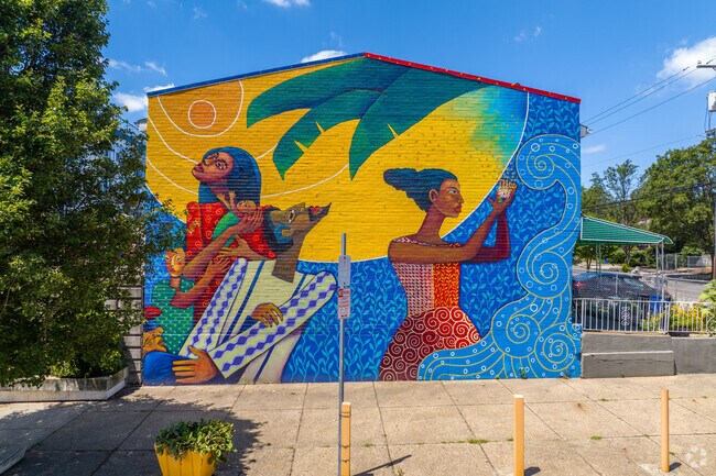Bright murals in Mill Creek run along N 48th Street.