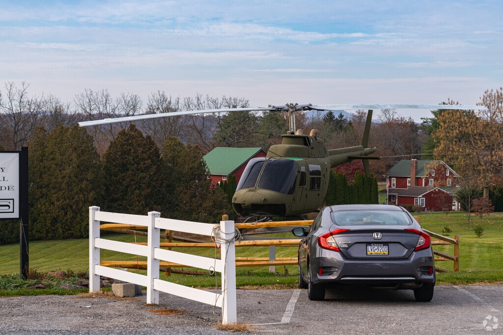 An old army helicopter sits on display in  Newberry Township in honor of its veterans.