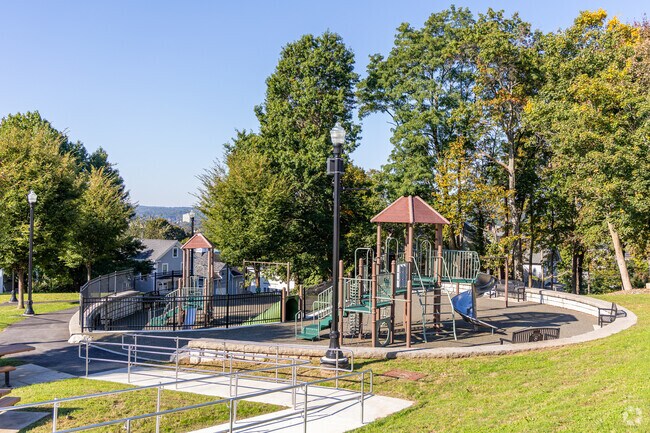 The beautiful Grant Square Park provides a playground, basketball court, and community garden.