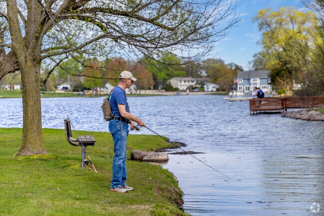 A local angler casts a line at Willow Point Park, a peaceful spot on the shore of Gages Lake.