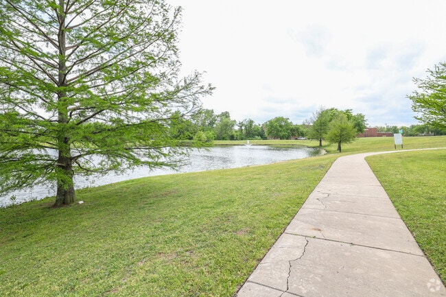 Walk the path around the pond at Leake Park in Sheridan Valley.