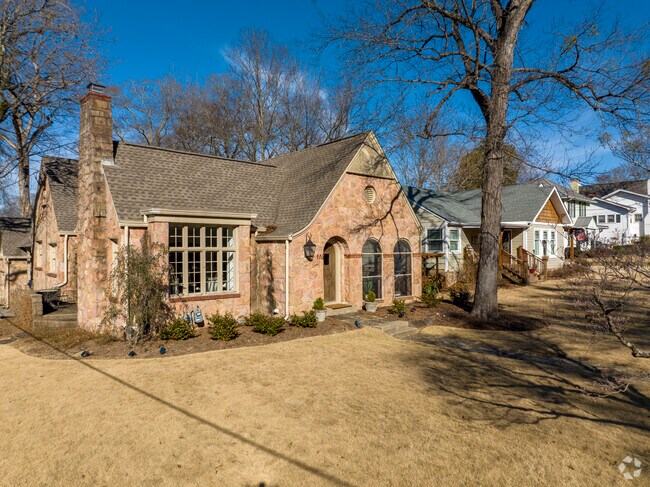 This large single-family home in Homewood displays intricate stone siding.