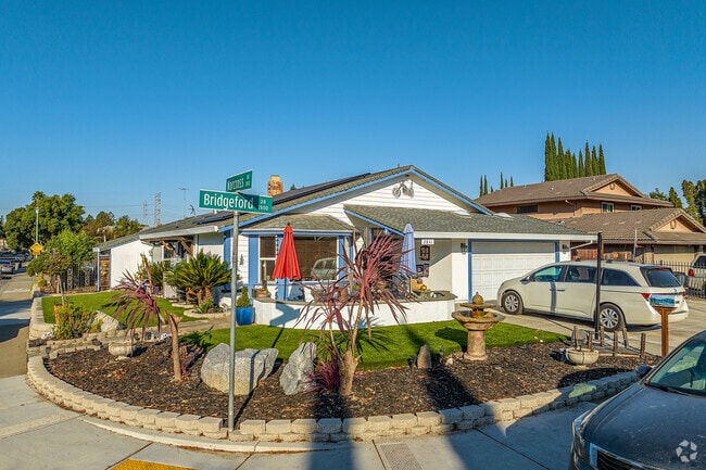 Water features and maintained landscape are features of this Northgate home.