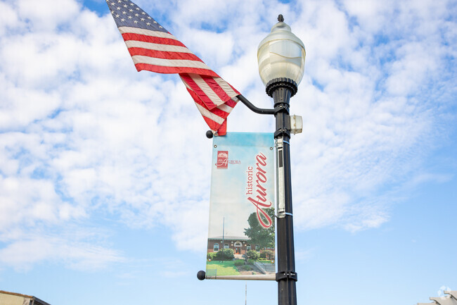 You will see Aurora neighborhood flags through the whole community.