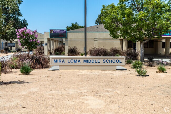 The signage at the entrance of Mira Loma Middle School proudly displays its name.