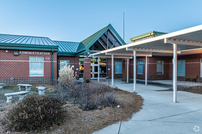 The entrance of Brier Creek Elementary School radiates a warm and inviting atmosphere.