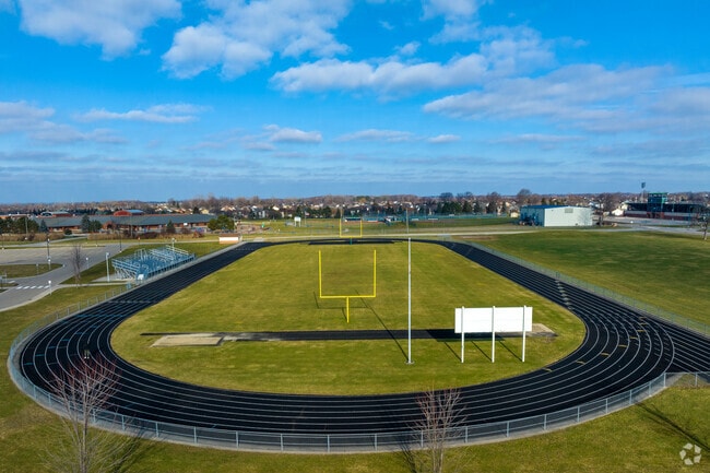 Runner on the track at Dakota High School in Macomb, Michigan.