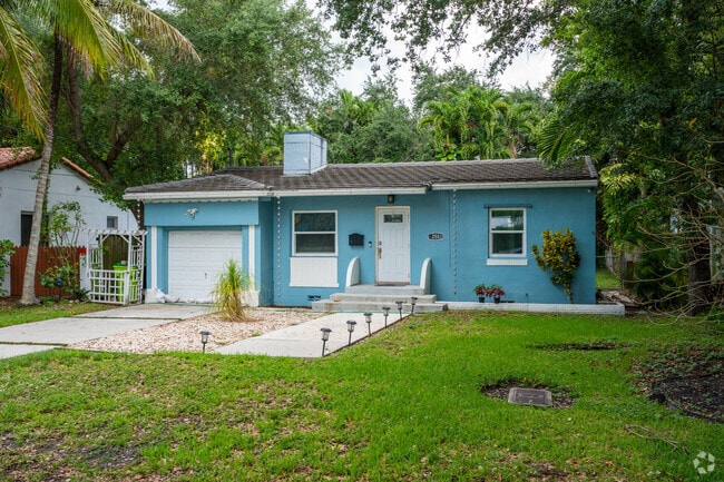 A turquoise ranch-style single-family home in El Portal.