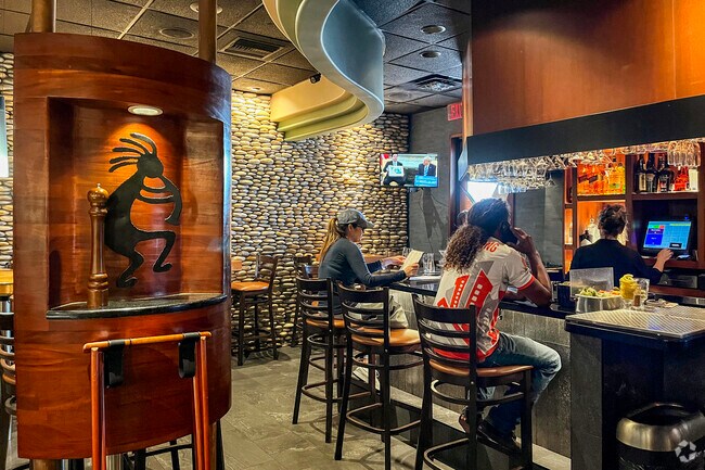 Kick back and have a nice cold beverage for Happy Hours at the E&E Stakeout Grill in Harbor Bluffs.