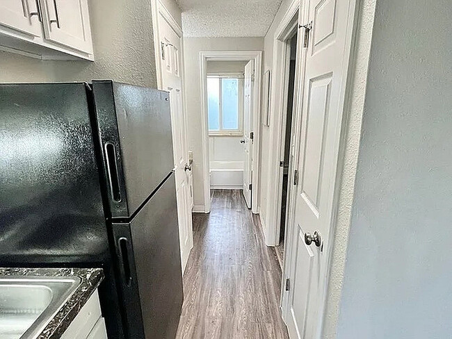 Explore this inviting hallway that combines modern design with functional elegance.