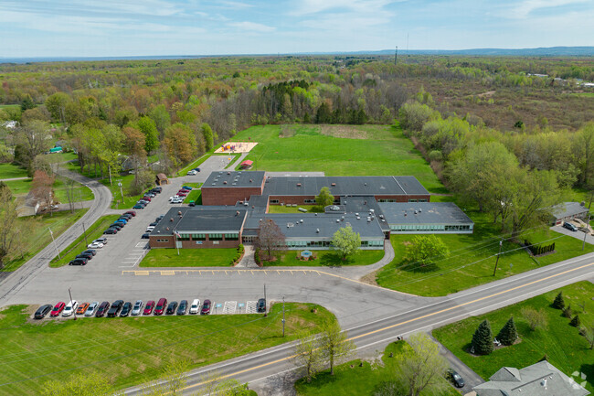 The parking lot runs along the front and side of Bridgeport Elementary.