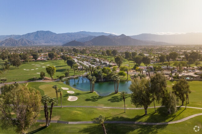 An elevated sweeping view of the gorgeous 18-hole golf course in Desert Falls, Palm Desert.