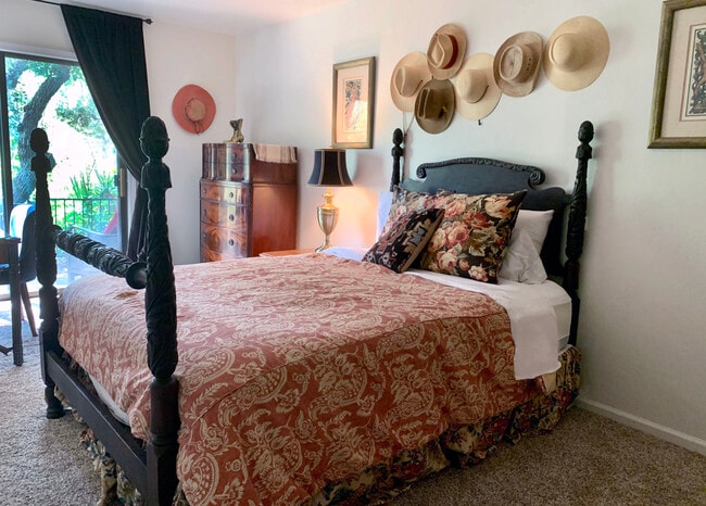 large second bedroom with queen bed