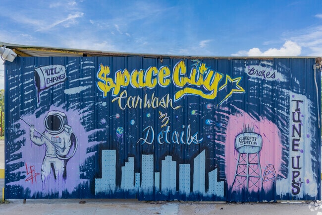 This mural captures local pride with astronaut, Houston skyline, and the Barrett water tower.