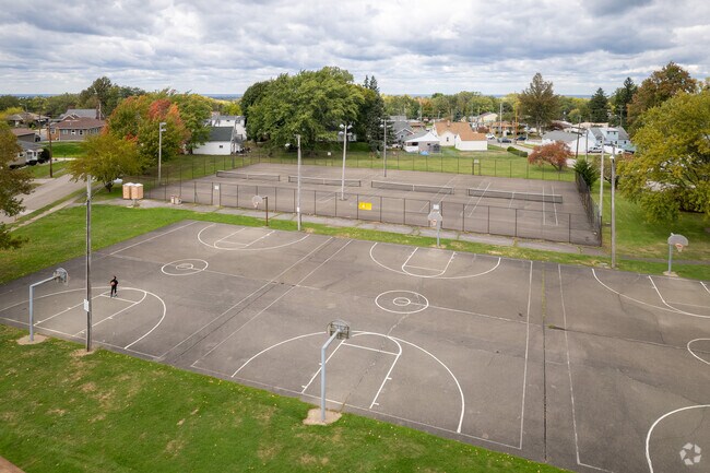 Burton Park has tennis and basketball courts, a playground and crisscrossing walkways.