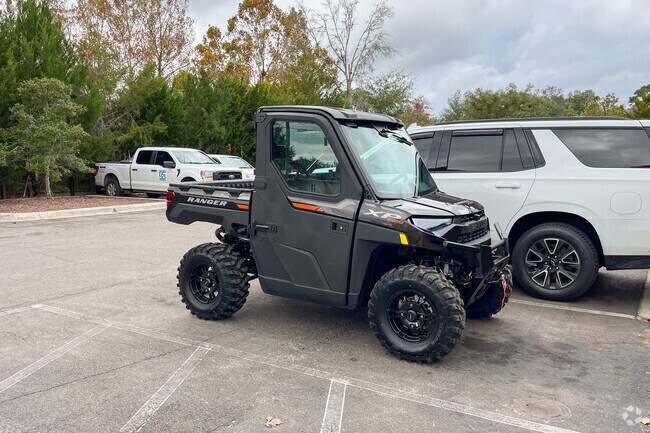 Some residents like to ride in town with their golf carts in the Asbury Lake neighborhood.