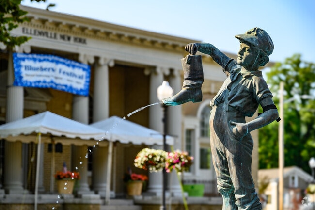 The Boy With The Boot is an iconic symbol of Ellenville, though similar statues exist worldwide.