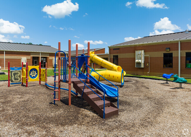 Poplar Road Elementary School has multiple playgrounds.