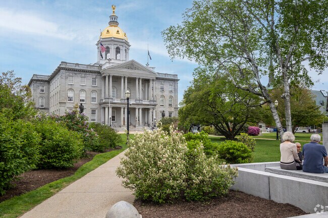 The New Hampshire State Capitol in Concord stands with its golden dome, symbolizing civic pride.